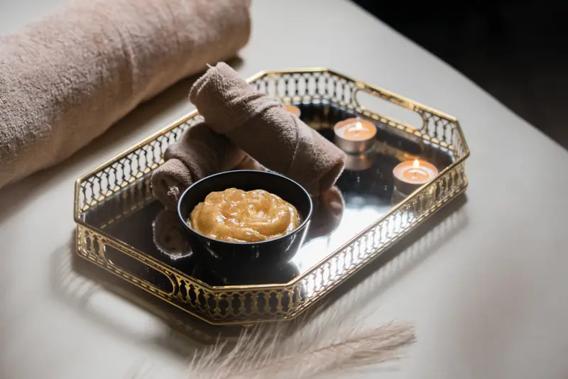 Honey scrub on gold tray